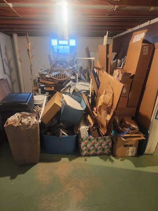 Roll-off dumpster container at job site for 2 Yard Dumpster Rental in Brownsville